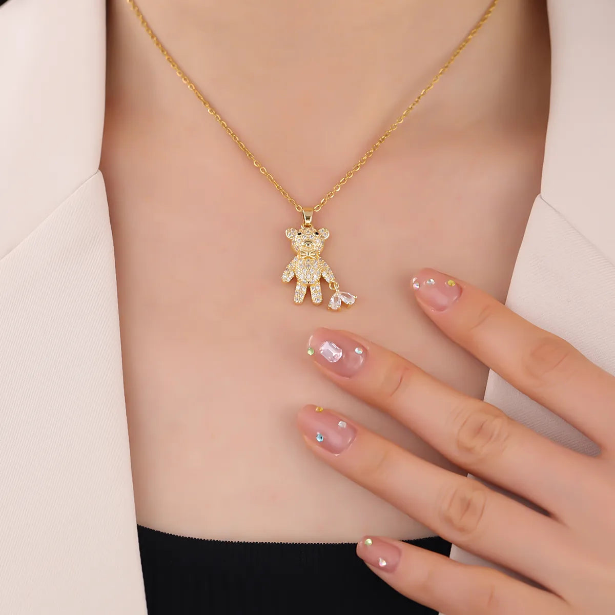 Gold Heart Pulling Bear Pendant