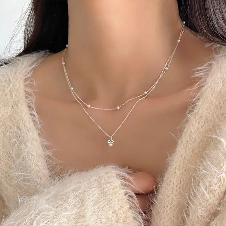 Mini Bow Pearl Pendant