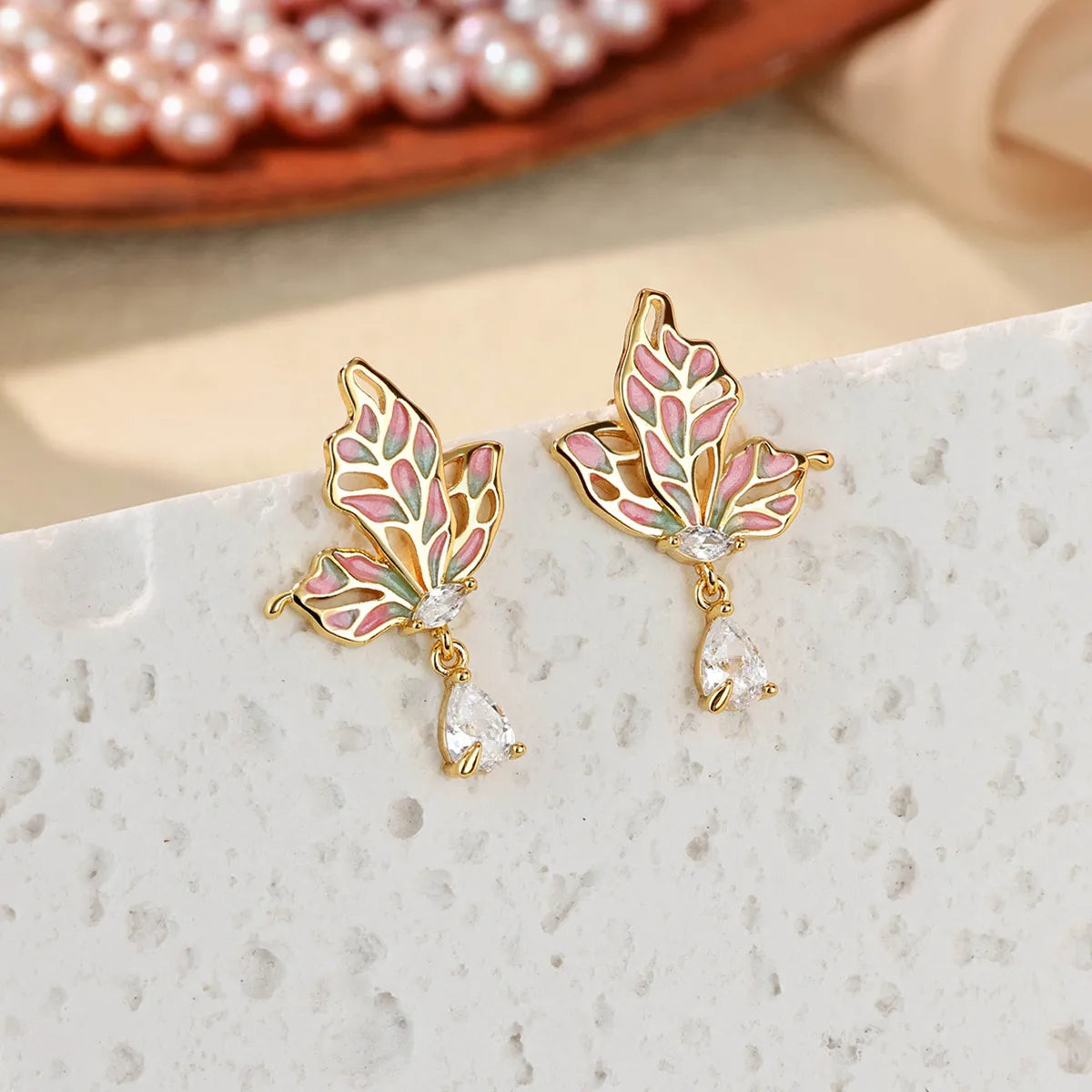 Gold enamel butterfly earrings – Lush