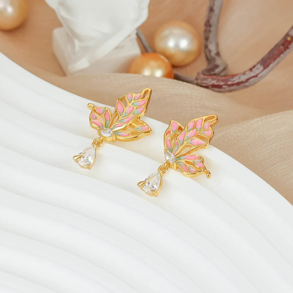 Gold enamel butterfly earrings