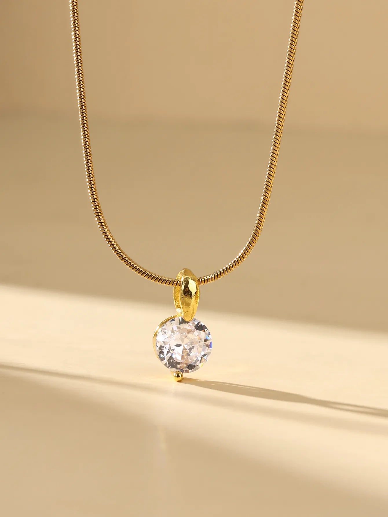 Gold Zircon Pendant