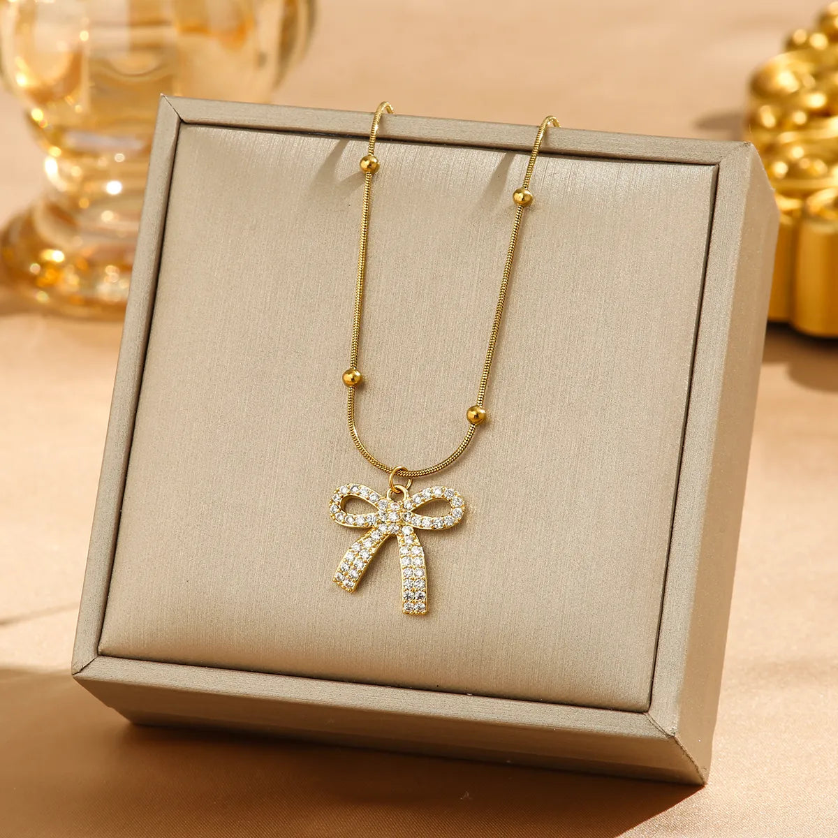 Gold Bowknot Pendant