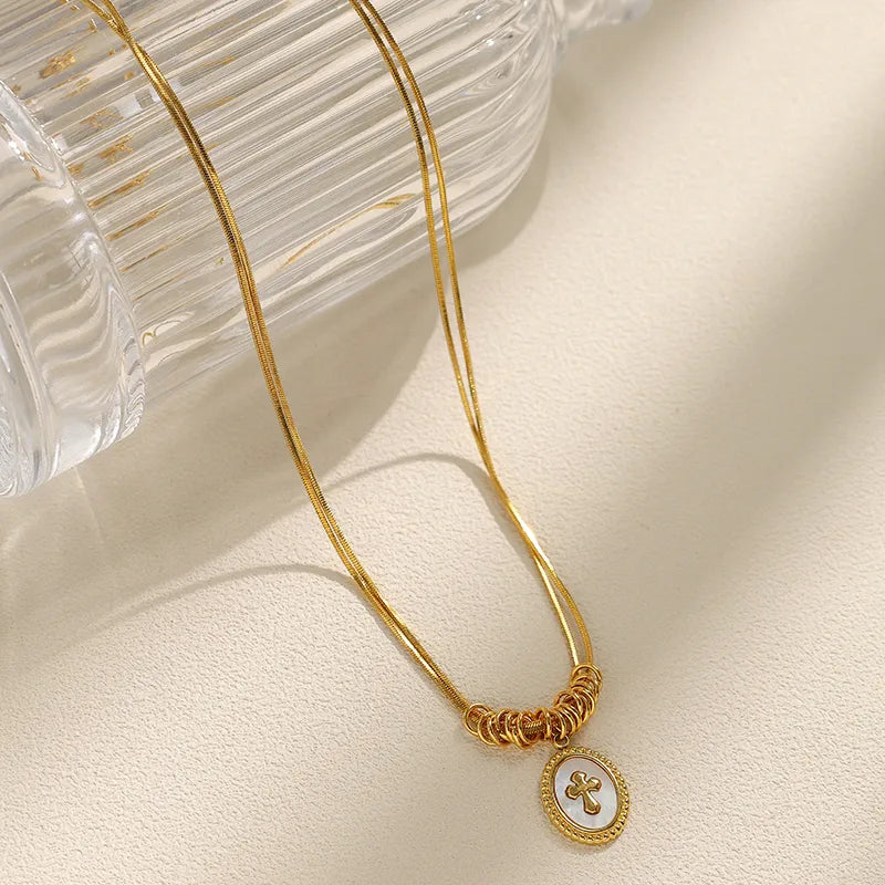 Gold Cross Oval Pendant