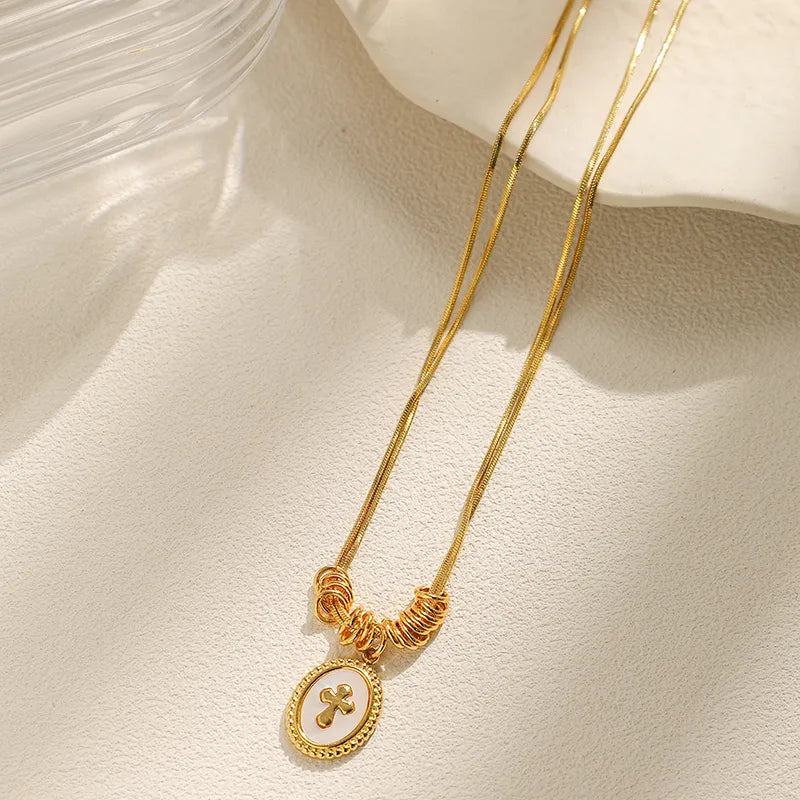 Gold Cross Oval Pendant