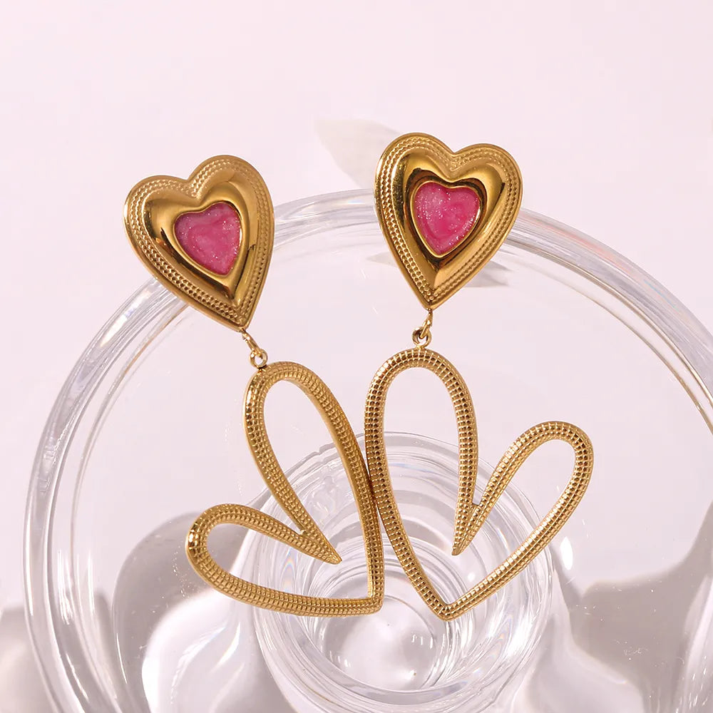 Dangling heart earrings