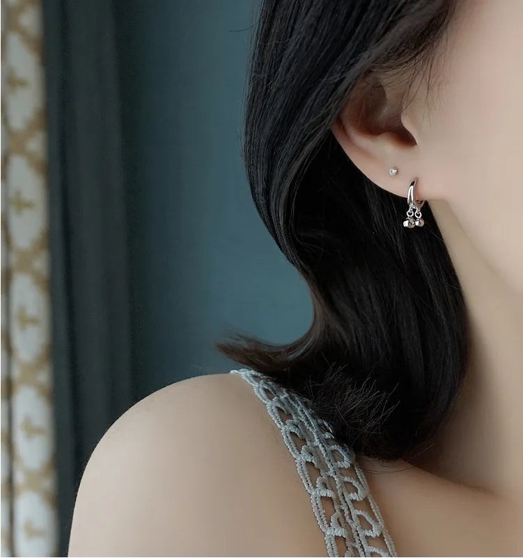 Silver bell earrings