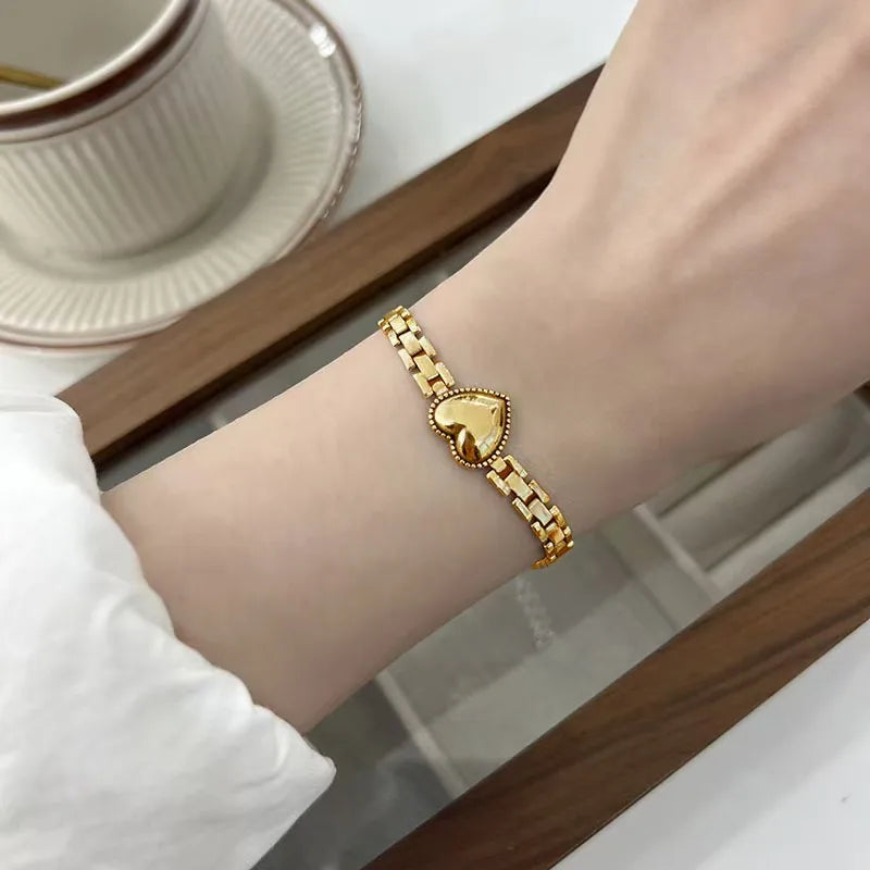 Gold heart belt bracelet