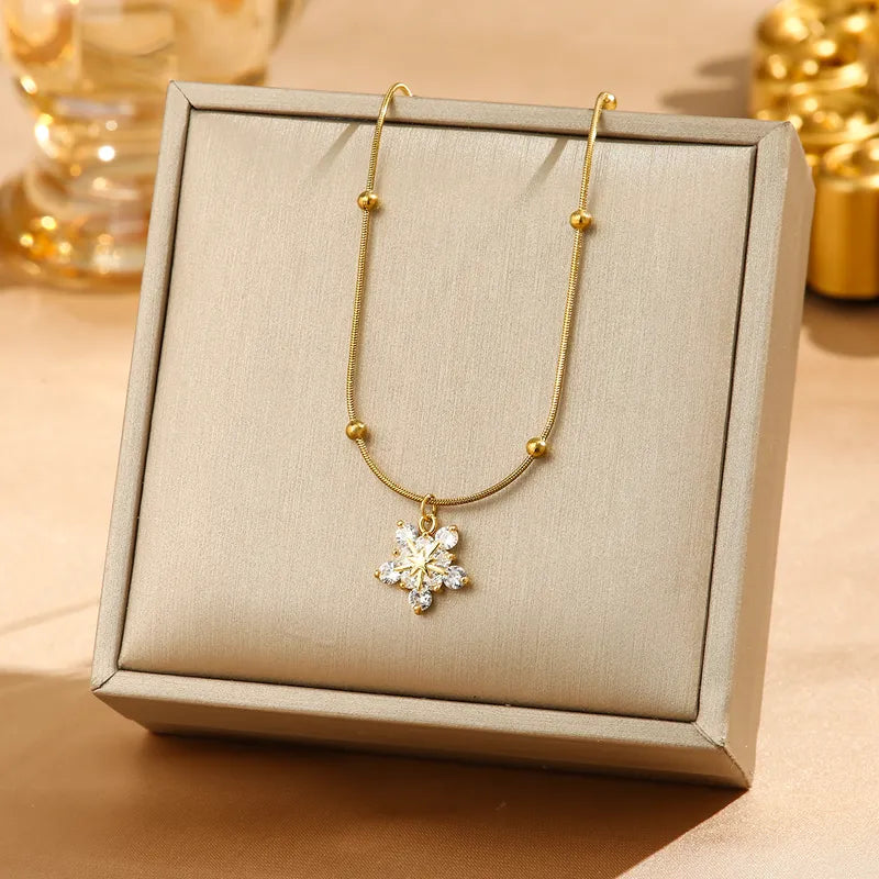 Gold Snowflake Pendant